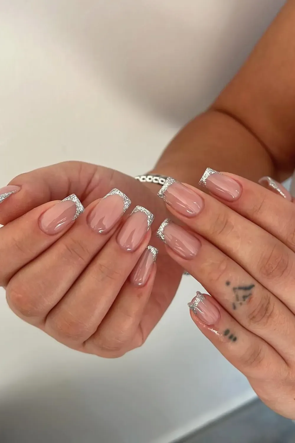 Glitter Silver Square French: Square nails showcasing a dazzling silver glitter French tip.