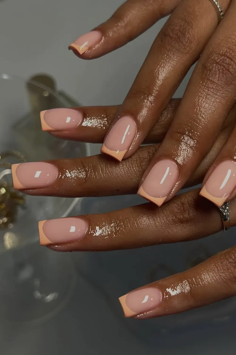 Peachy Keen Square French: Square nails with a soft, cheerful peachy orange French tip.