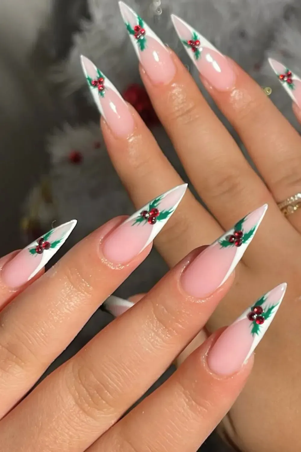 White French Stiletto Nails with Holly - Long stiletto nails with white French tips decorated with green holly and red berries