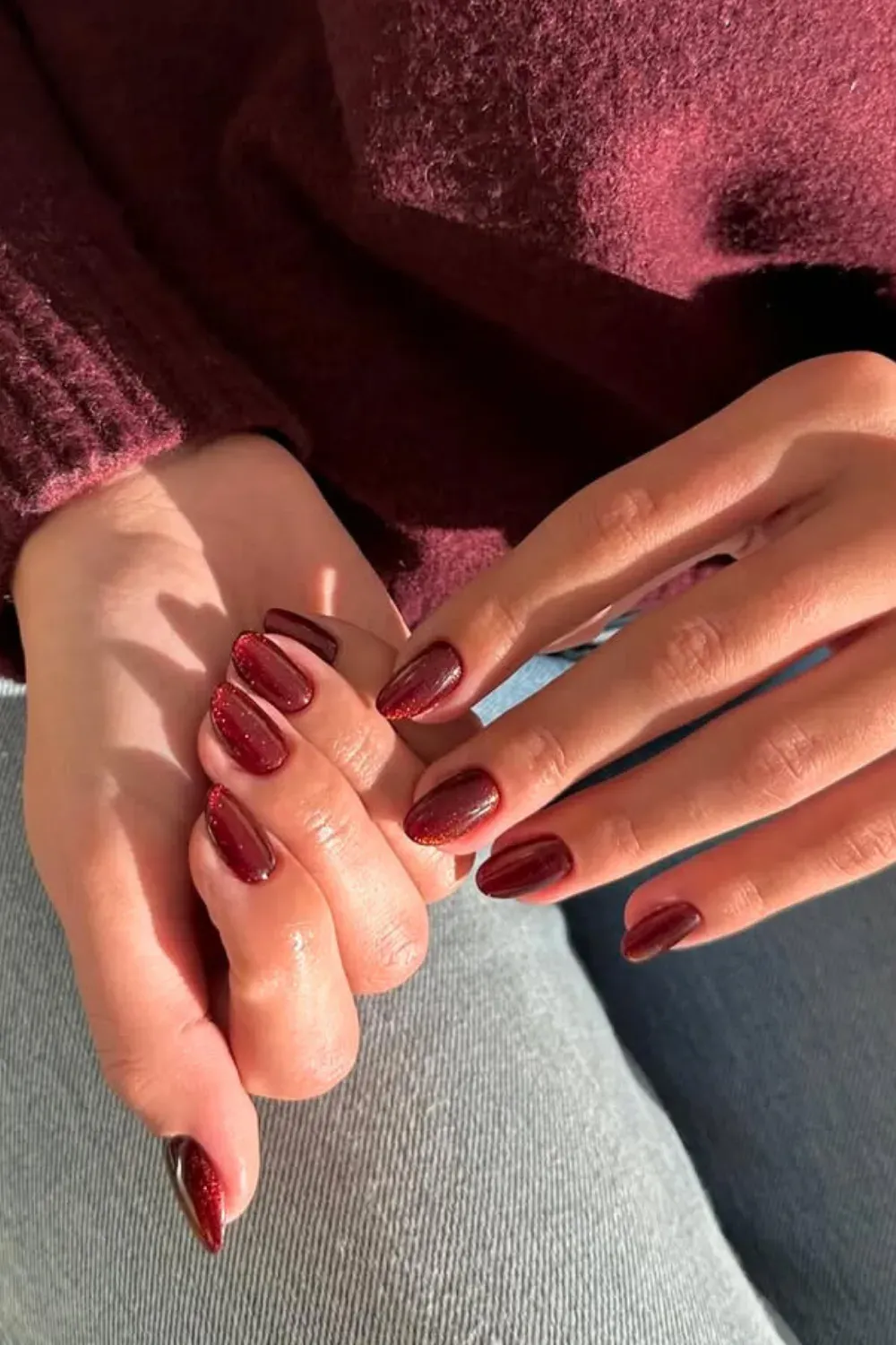 Simple Dark Red Glitter Oval Nails - Oval-shaped nails completely covered in a rich, dark red glitter polish.