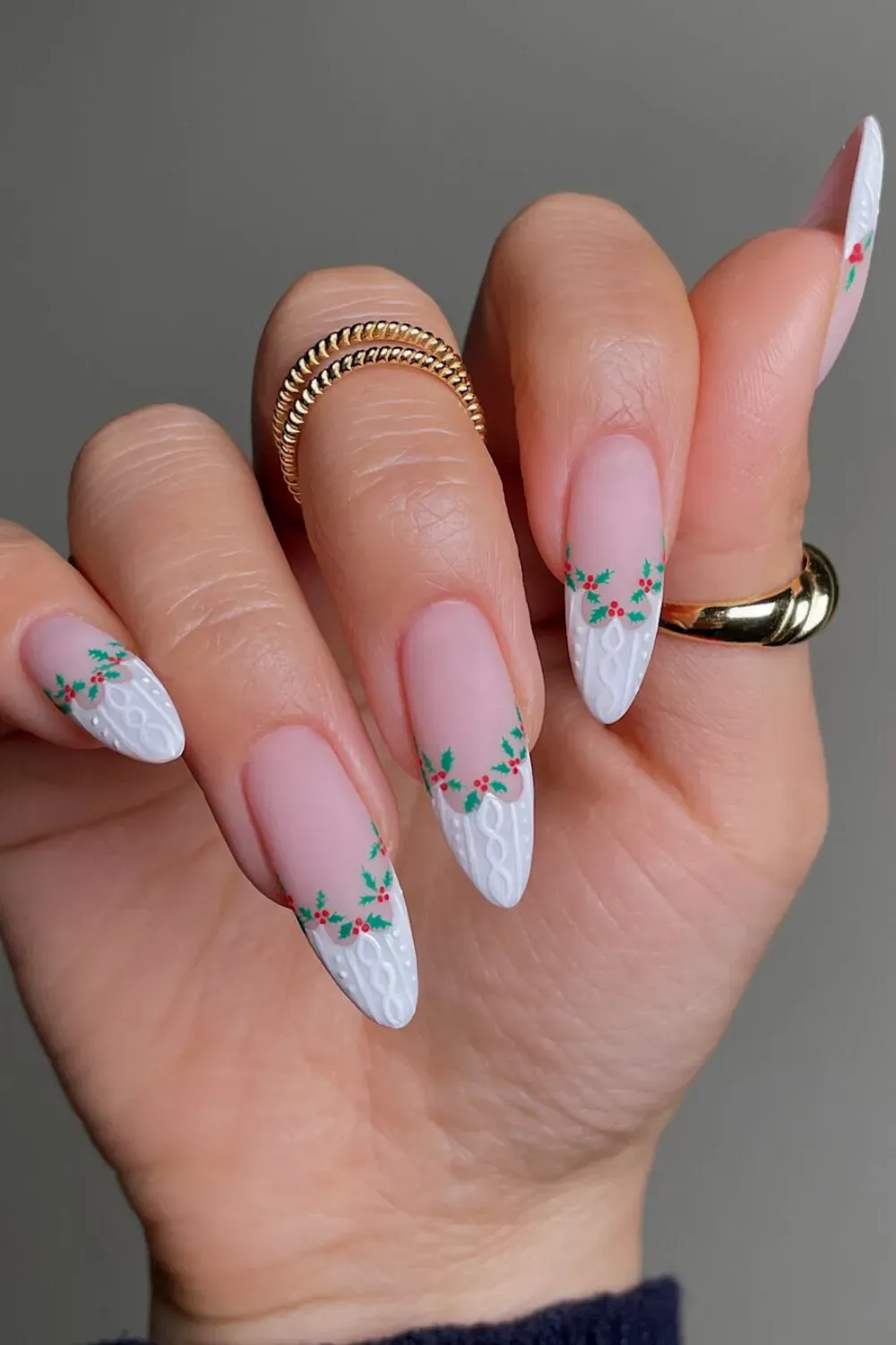 White Knit French Nails with Holly - Almond nails with white cable knit texture on the French tips, accented with holly