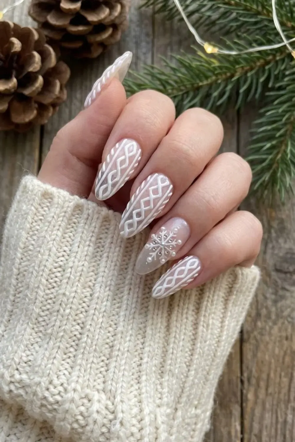White 3D Knit Sweater Nails with Pearls - Sheer white almond nails with cozy 3D knit patterns and elegant pearl accents.
