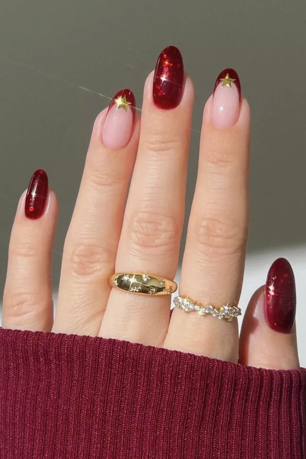 Red Glitter French Tips with Gold Stars - Red jelly glitter french tips adorned with small gold star stickers.