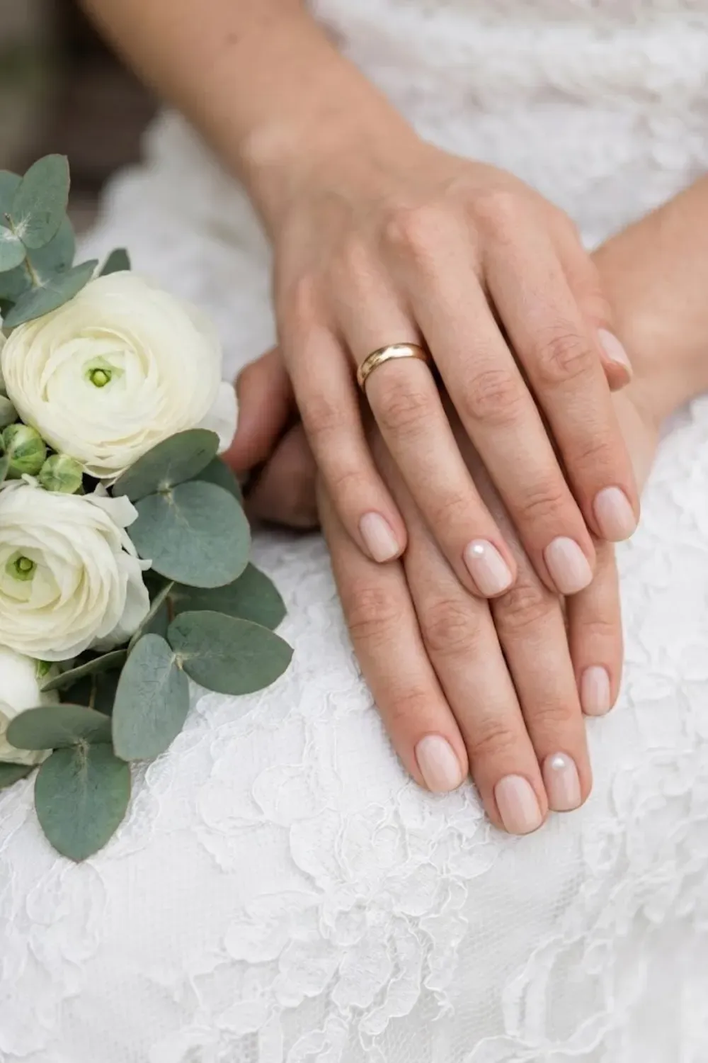 Minimal Single Pearl Accent - Very short nails; one tiny pearl dot at the bottom of each nail.