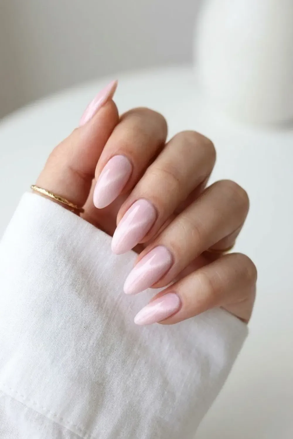 Baby pink velvet cat eye nails with subtle magnetic sheen