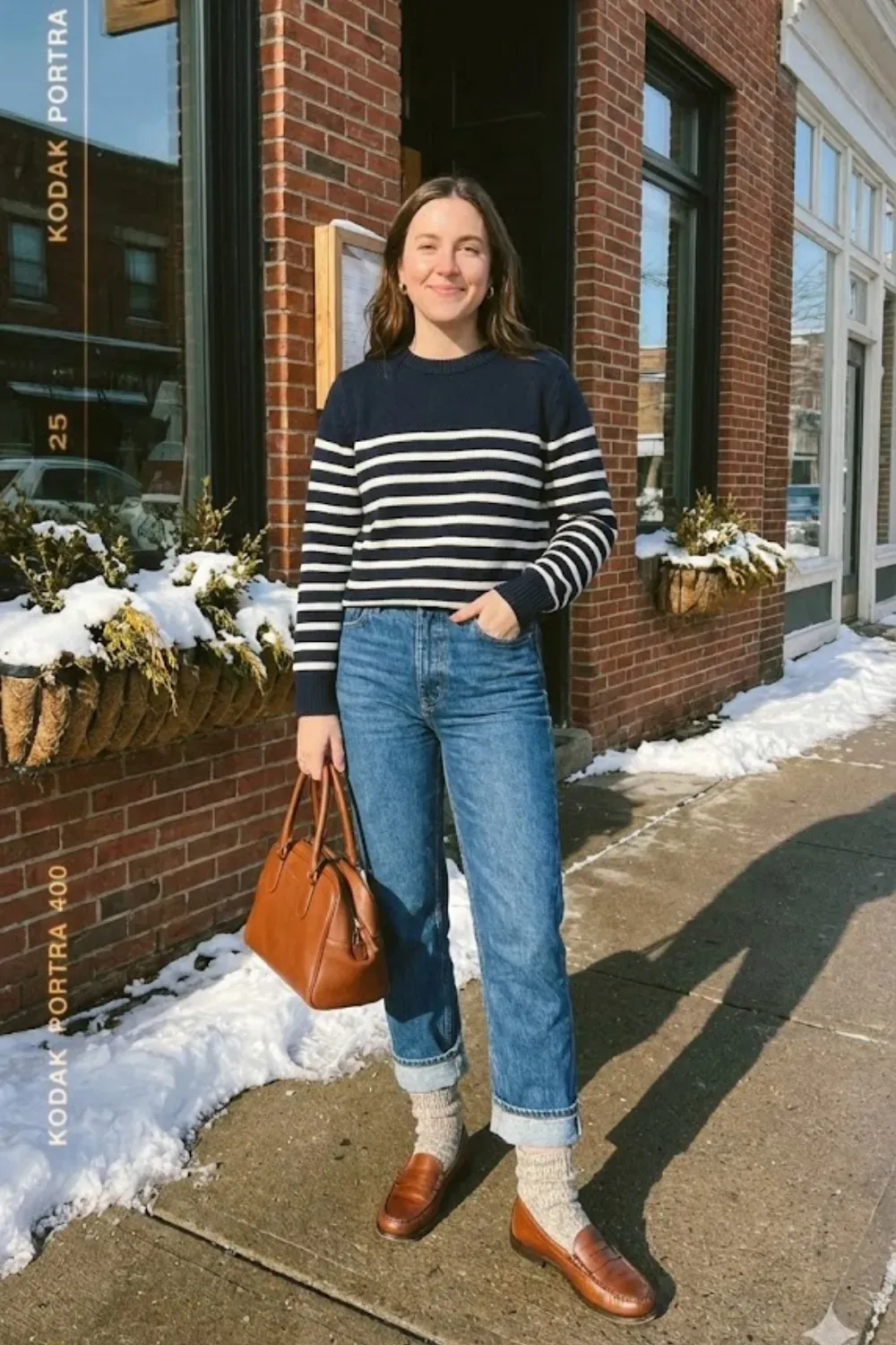 Navy Striped Sweater & Loafers - Classic navy and white striped sweater paired with cuffed blue jeans, wool socks, and brown loafers.
