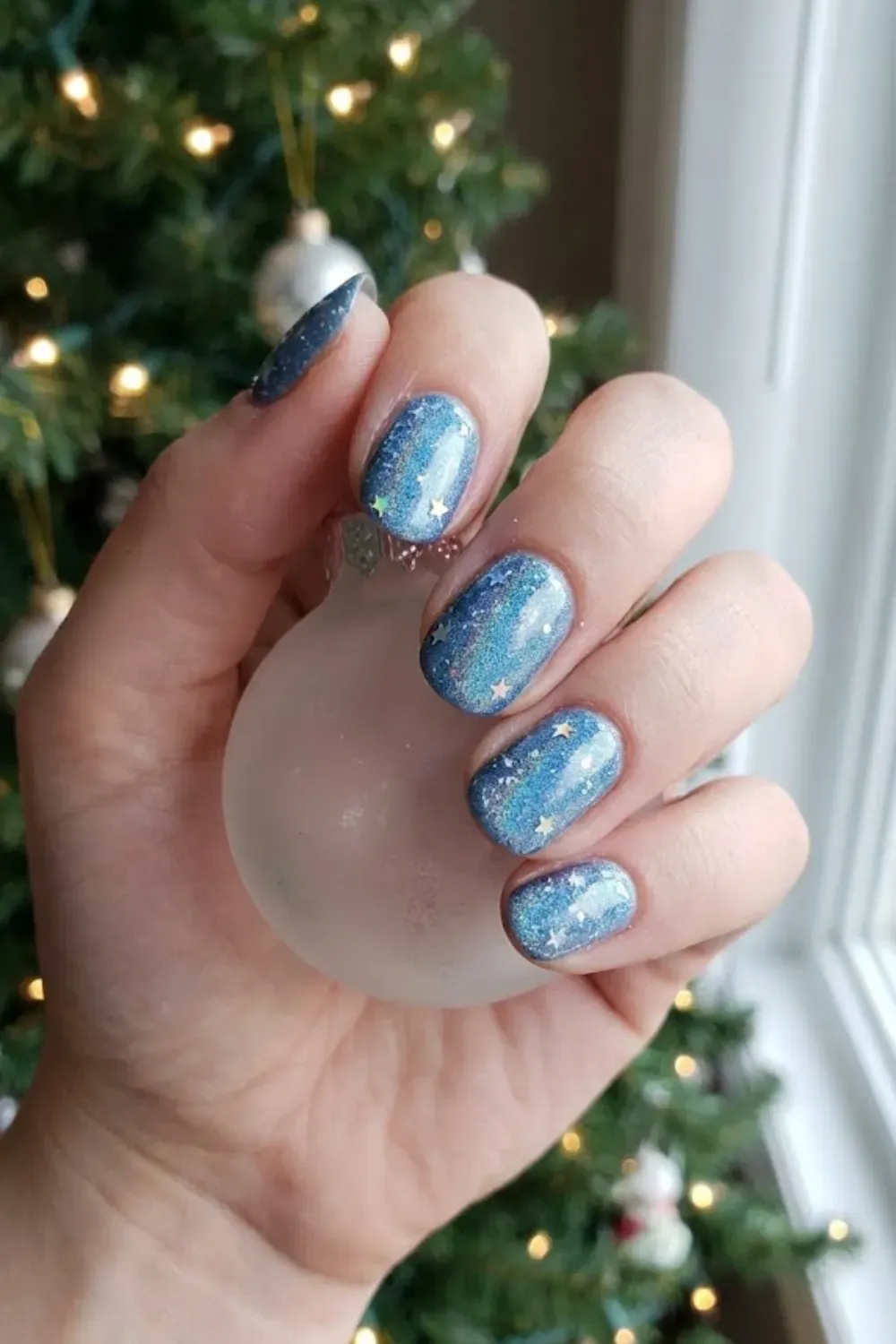 Icy Silver Gradient on Light Blue - square light blue nails with concentrated silver holographic glitter gradient from cuticle