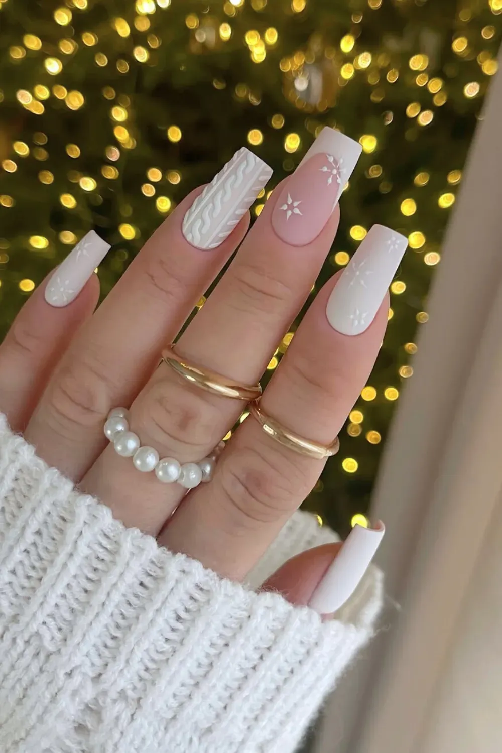 Matte Sweater Weather - Matte coffin nails in pink and white featuring 3D sweater texture and snowflakes.