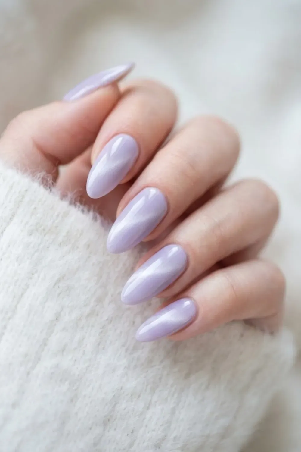 Soft lavender cat eye nails with dreamy pastel magnetic finish