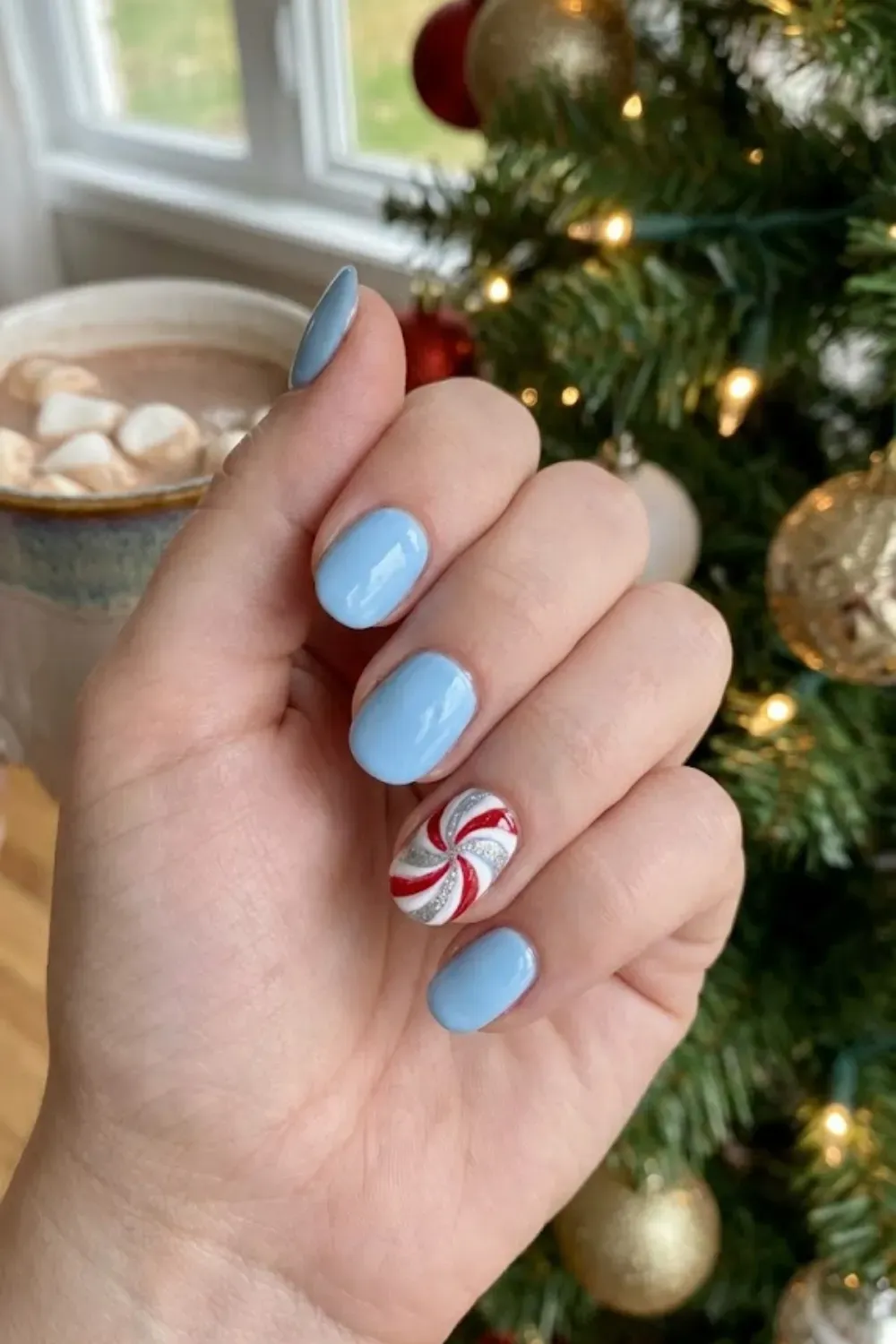 Baby Blue Peppermint Swirl Accent - short baby blue nails with red and white candy cane glitter accent nail