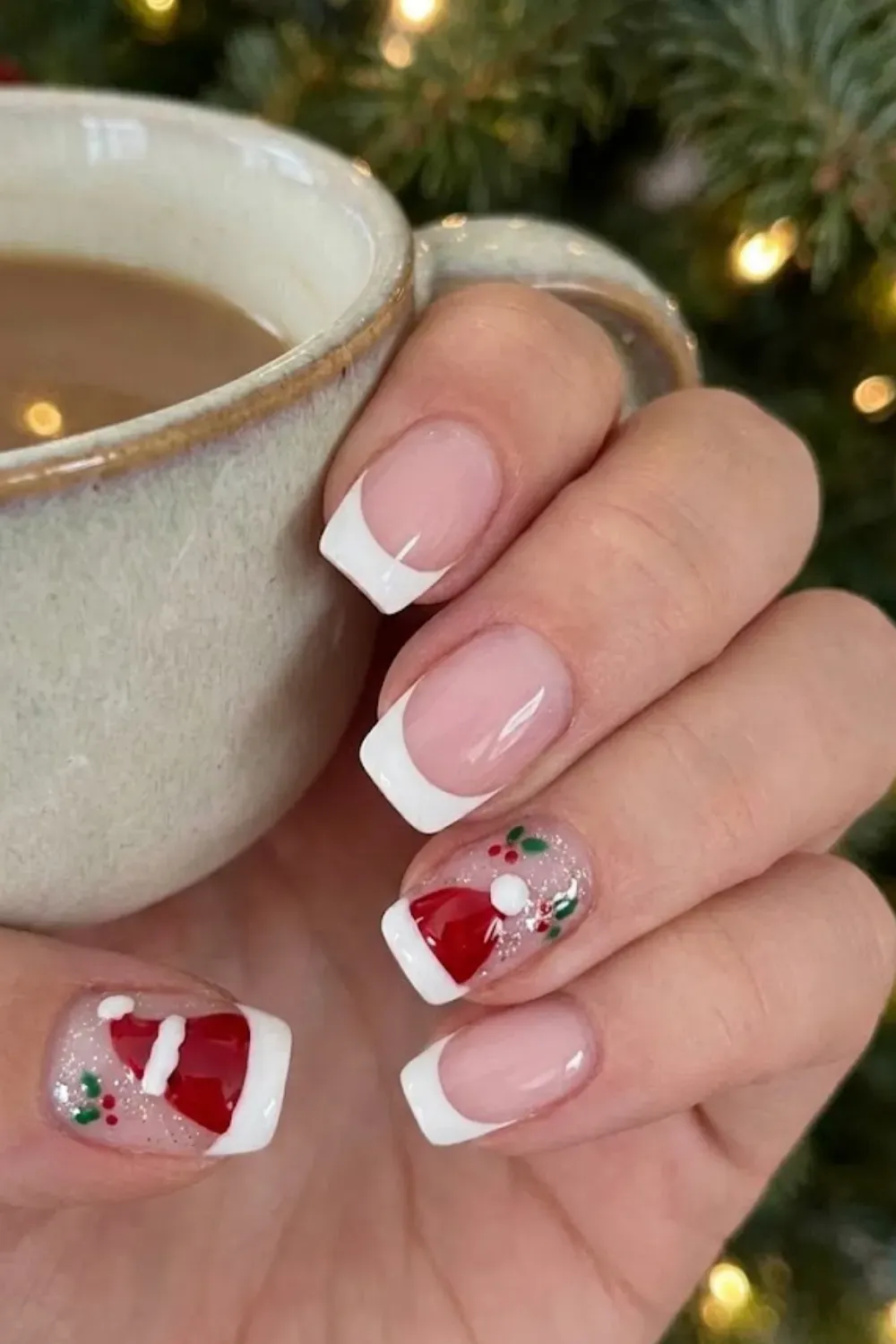 Santa Hat French Tips — square nails with white French tips and cute Santa hat holiday art
