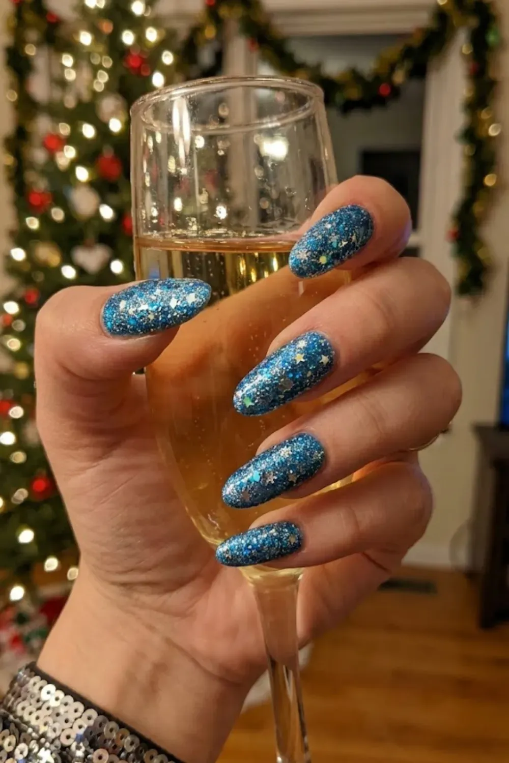 Chunky Blue and Silver Holo Glitter - long oval nails packed with chunky blue and silver holographic glitter and stars