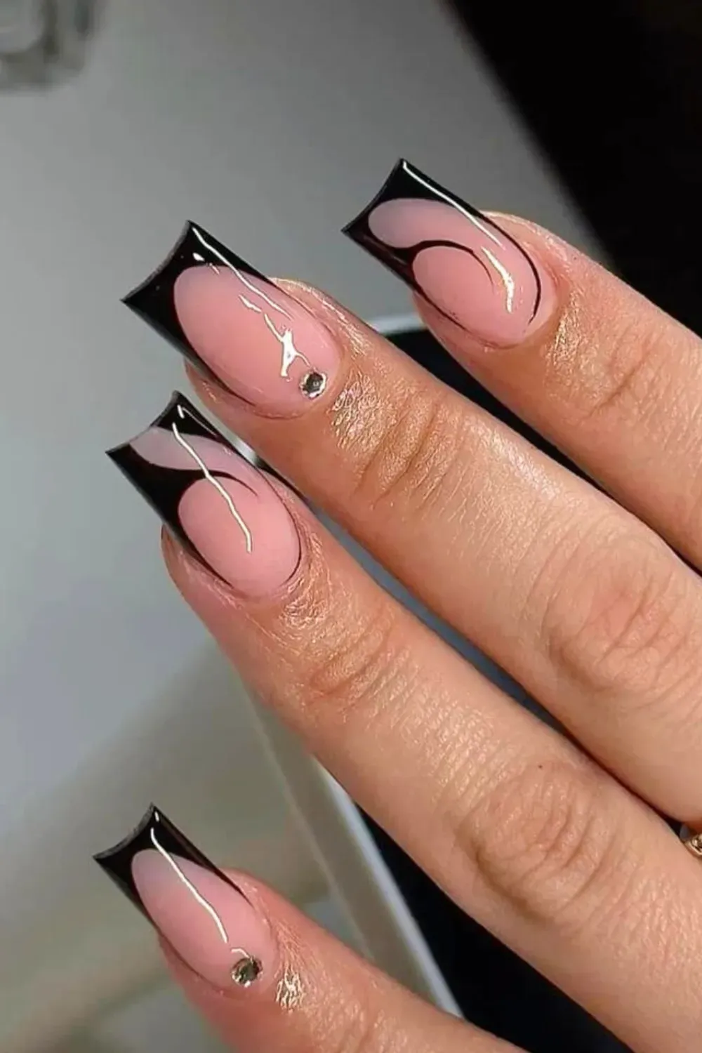 Abstract Flame Tips	Square pink nails with black abstract flame tips