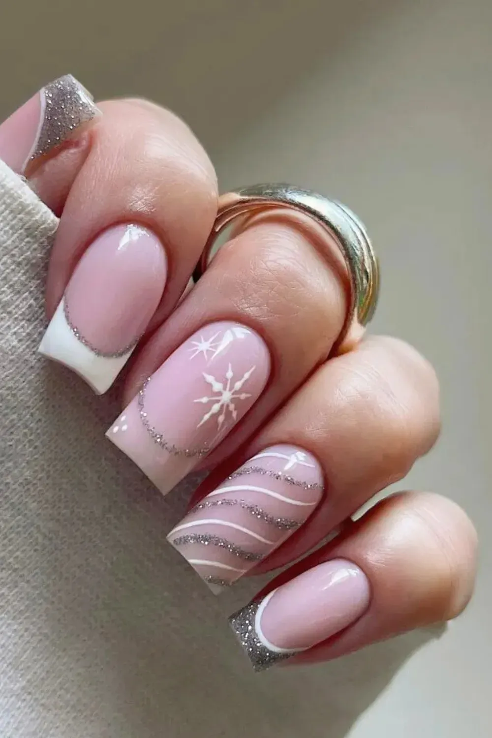Festive Silver Swirls - Square pink nails with silver glitter swirls, french tips, and snowflake art