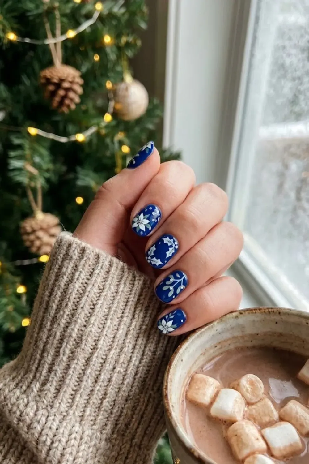 Short Royal Blue Holiday Florals - short royal blue nails with white holiday floral and poinsettia art