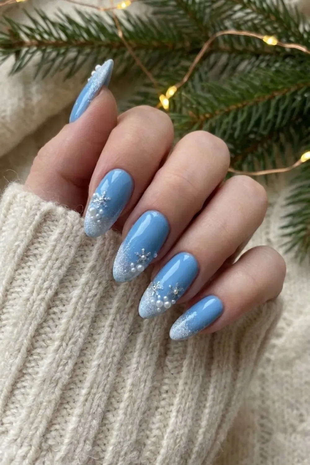 Icy Blue Glitter French Fade - almond sheer nails fading into sparkling icy blue glitter french tips