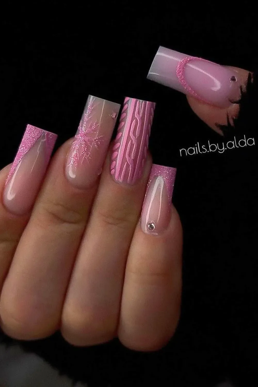Translucent Knit & Sparkle - Jelly pink coffin nails with glitter snowflakes and 3D sweater knit design.