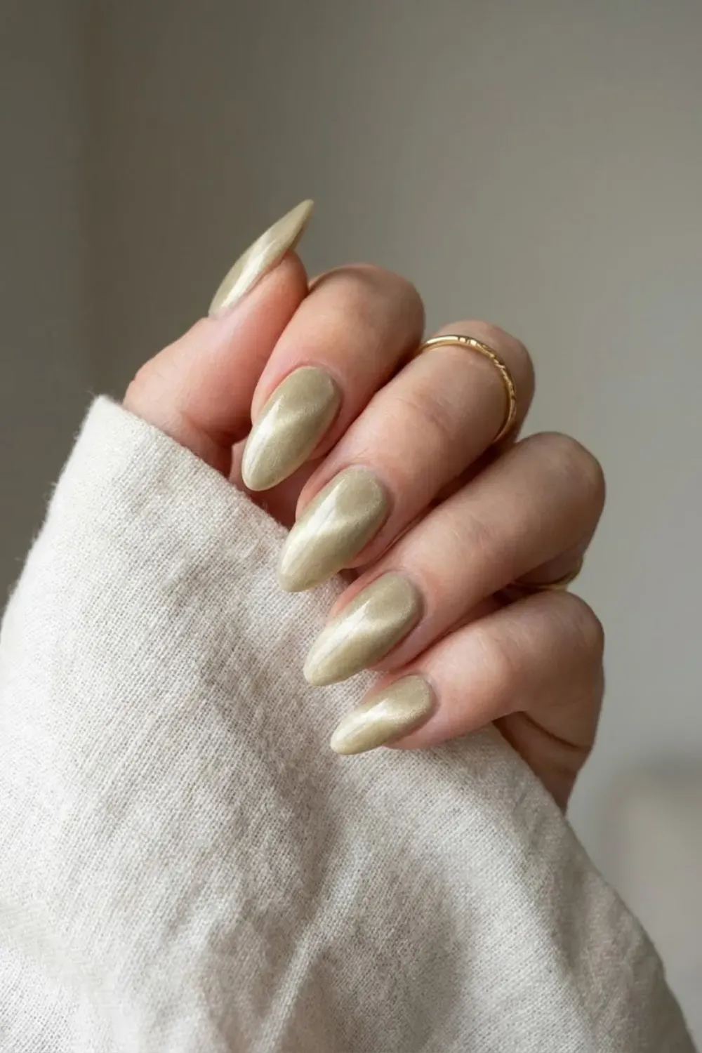 Muted gold velvet cat eye nails with soft luxury magnetic finish