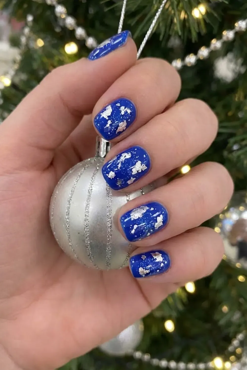 Cobalt Blue with Silver Foil Flakes - short square cobalt blue nails with scattered silver metallic foil flakes