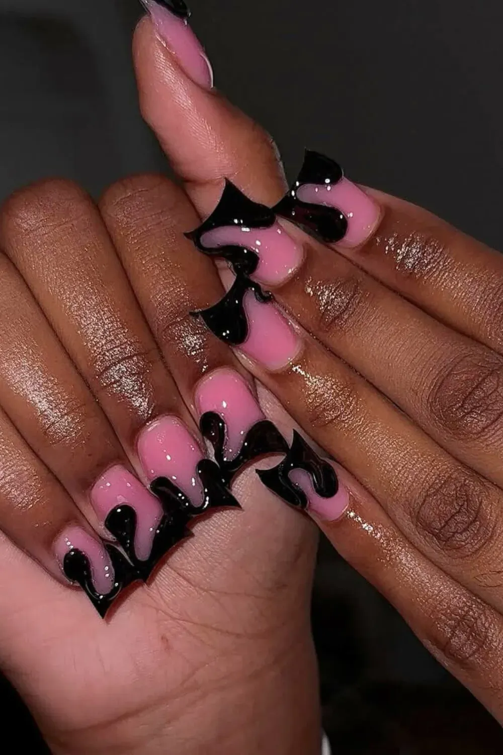 Black and Pink Drip	Square pink nails with black 3D drip or flame design