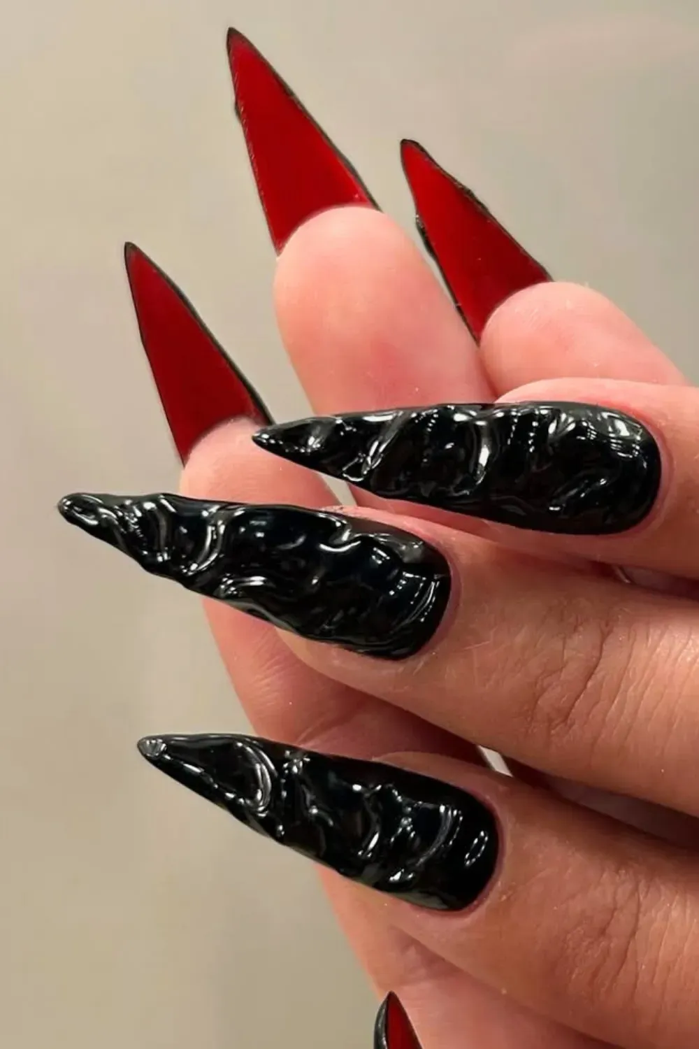 Molten Metal Red Bottoms	Textured black chrome nails with red underside