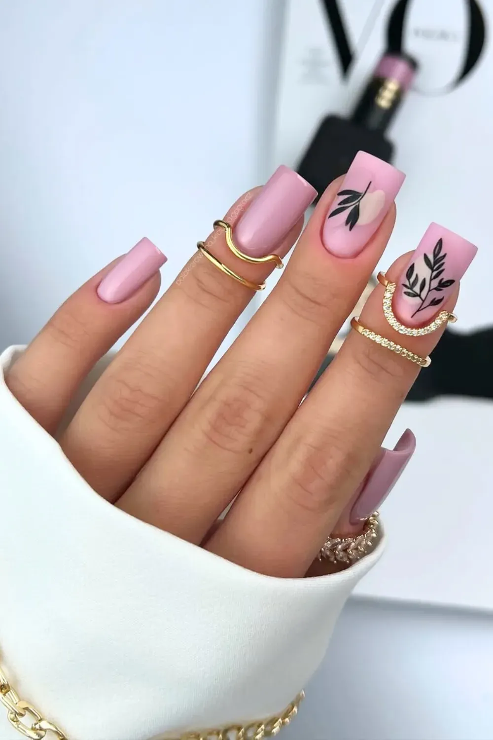 Winter Botanical Matte - Matte dusty pink square nails featuring black botanical leaf nail art.