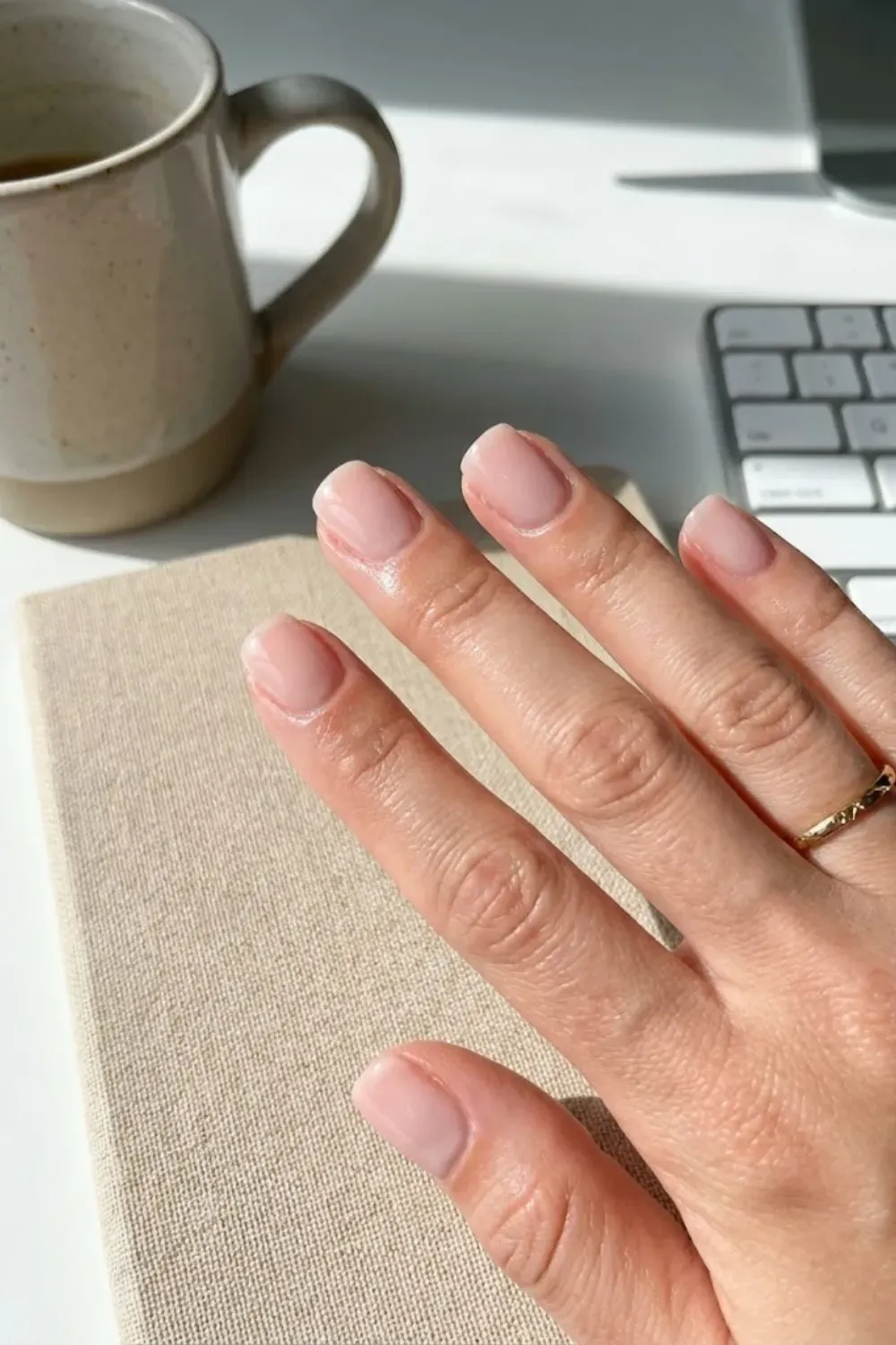 Sheer Blush Pink Square - Short square nails with a glossy, healthy sheer blush pink manicure, perfect for everyday office wear.