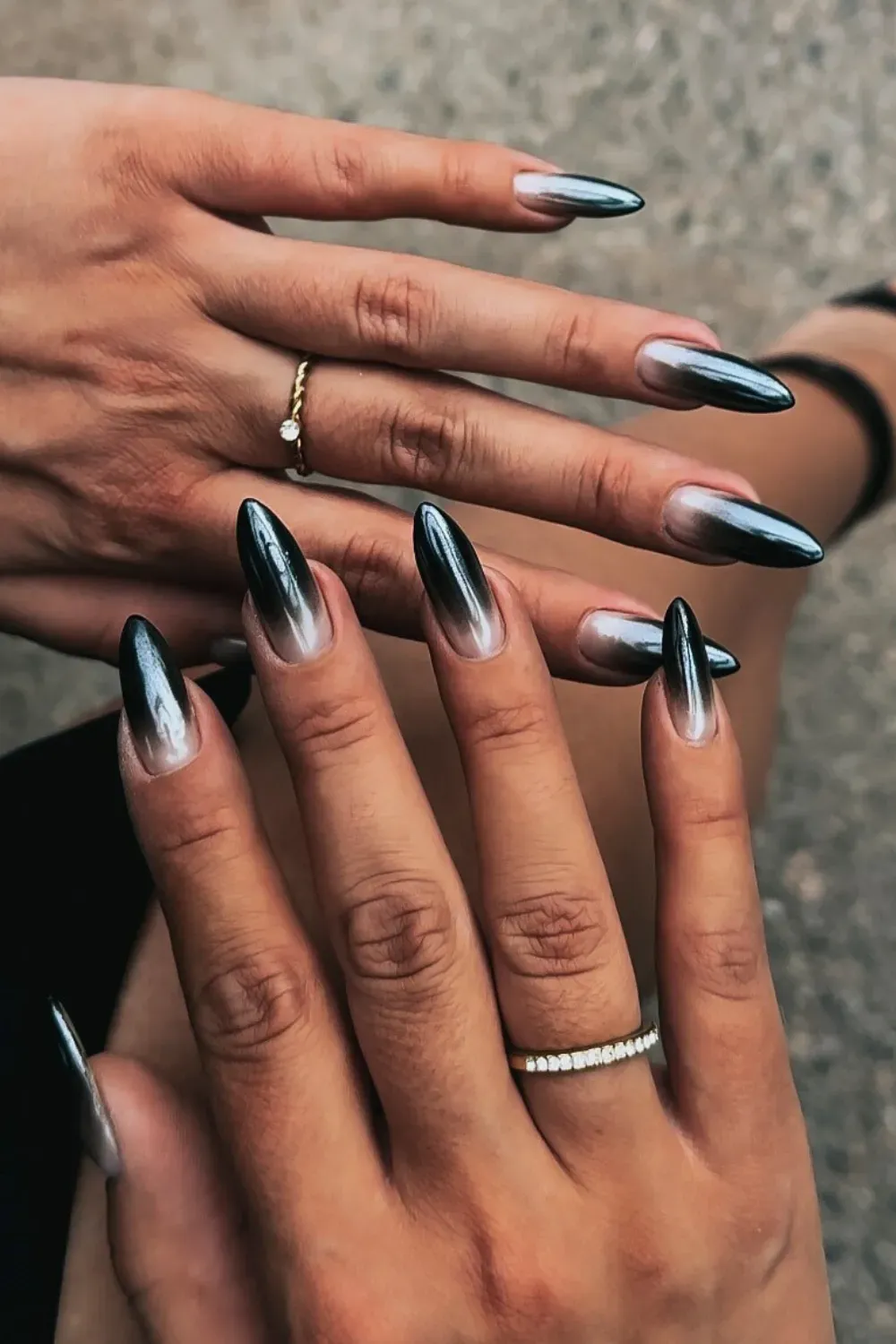 Sleek Black to Silver Ombré	Almond nails fading from black to silver chrome