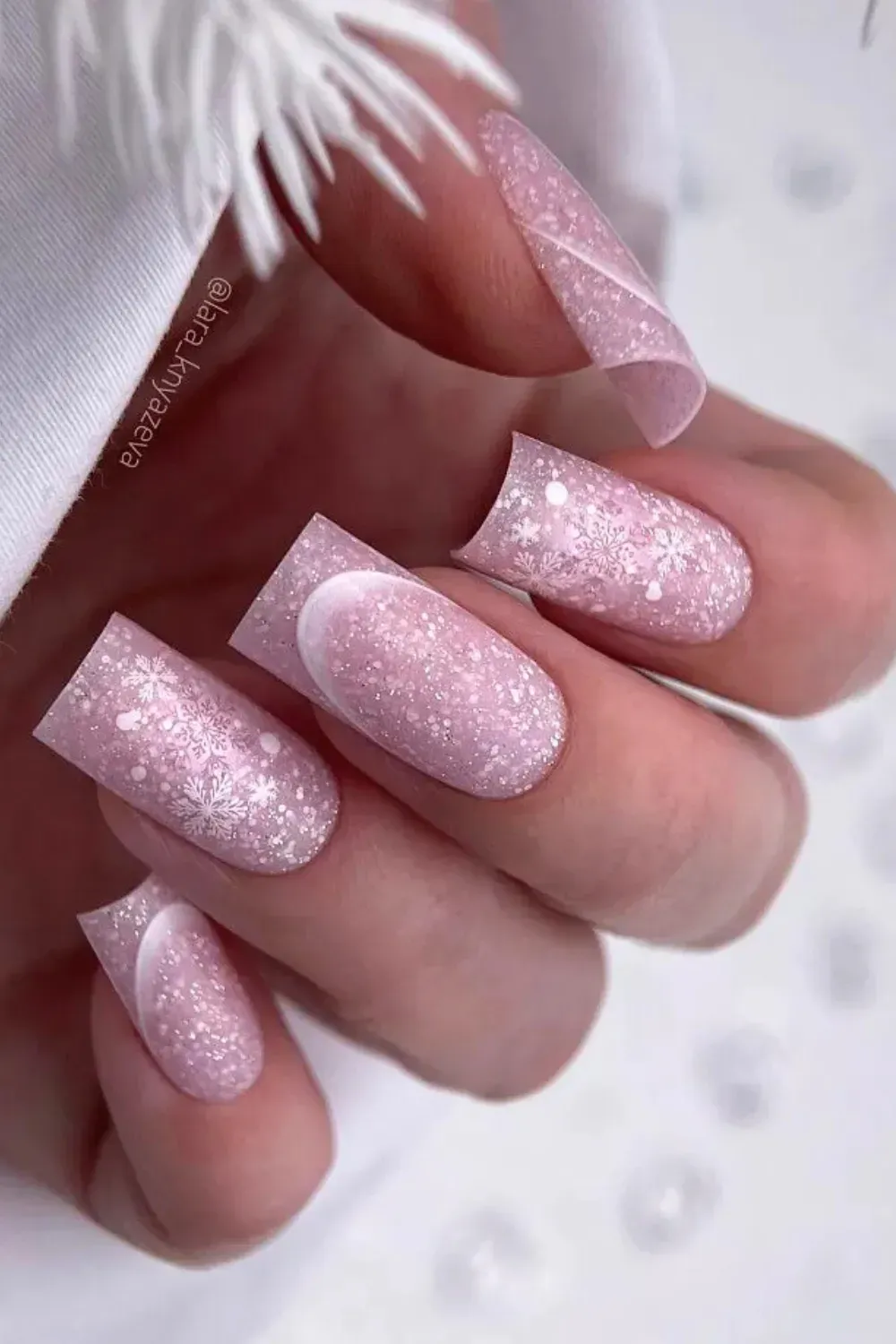Icy Glitter Squares - Square acrylic nails with clear tips, pink chunky glitter and white snowflakes.