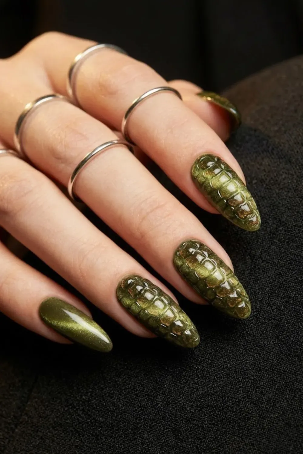 Olive green cat eye nails with textured reptile skin 3D nail art effect