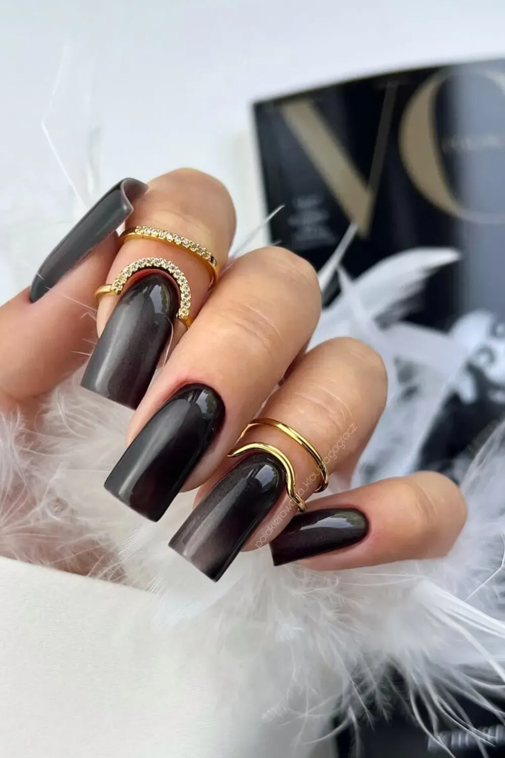 Black Cat-Eye Velvet Nails	Square nails with magnetic black velvet cat-eye effect