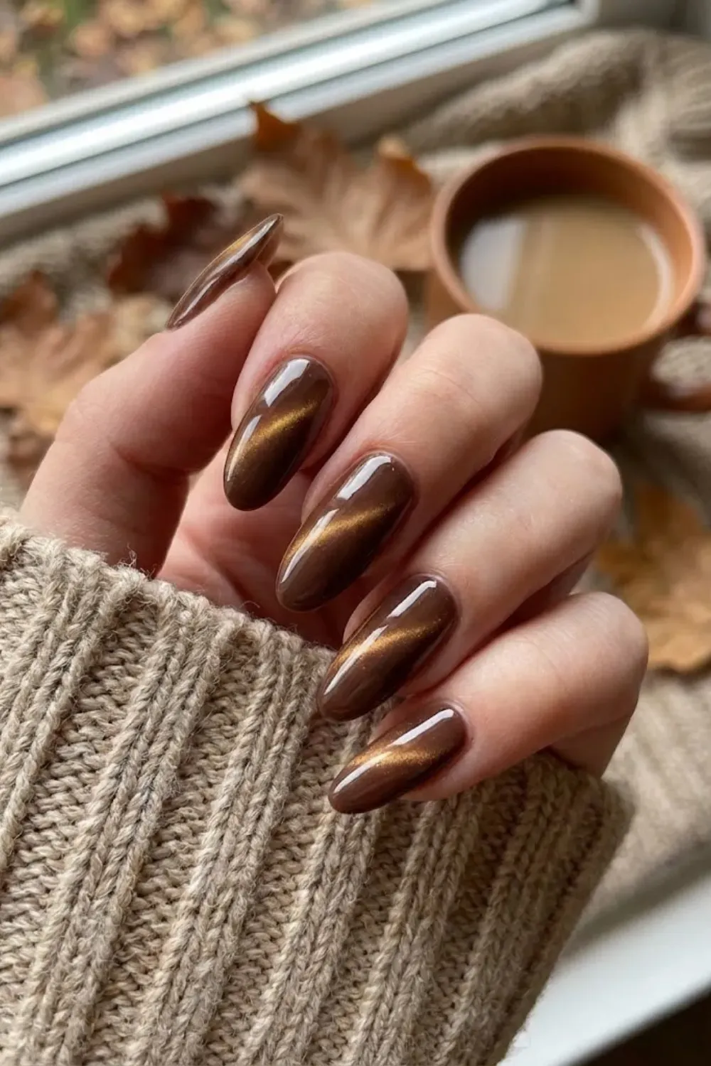 Chocolate brown cat eye nails with cozy warm magnetic shimmer