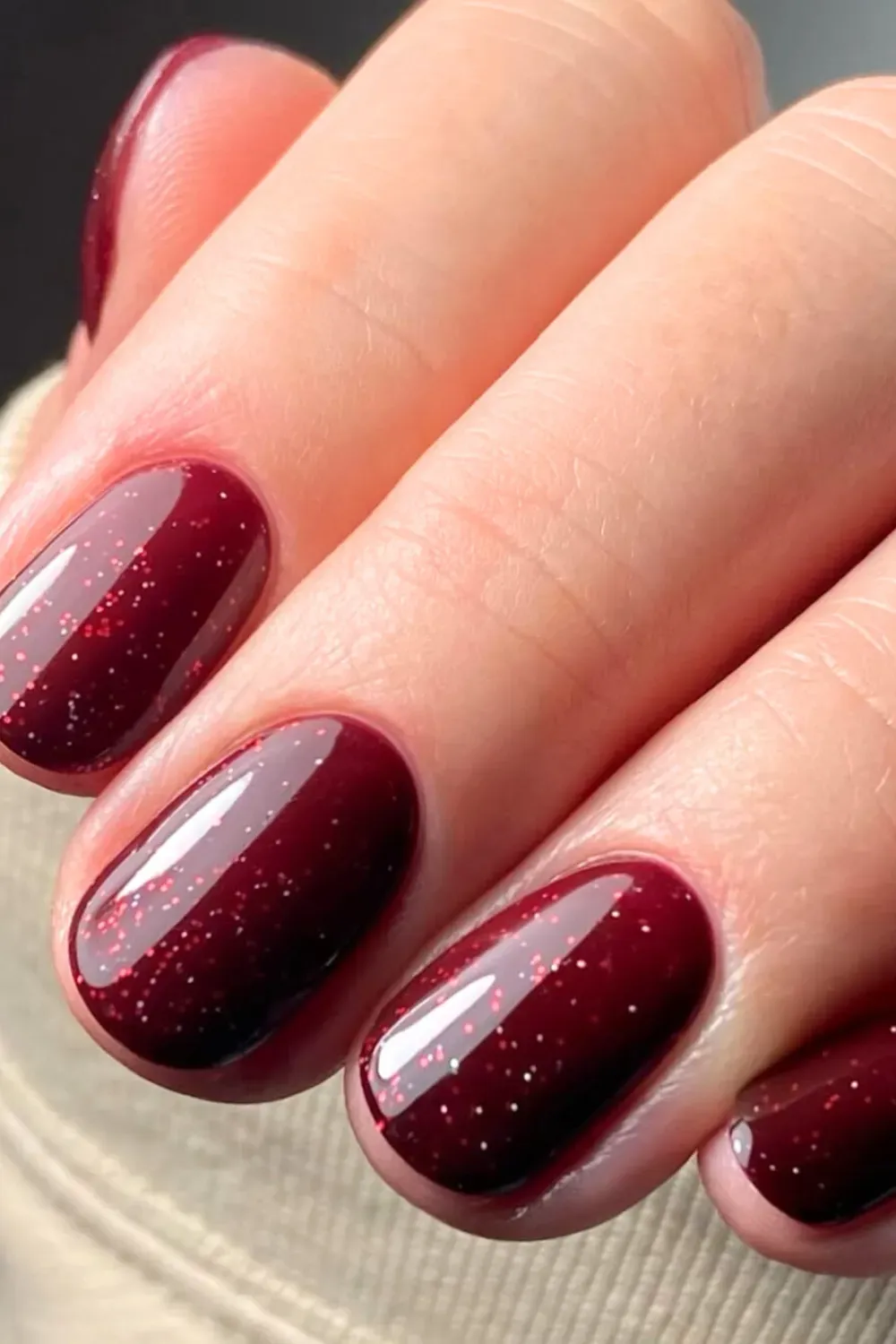 Dark Cherry Burgundy Glitter Nails - Short dark cherry red nails with subtle embedded red glitter.