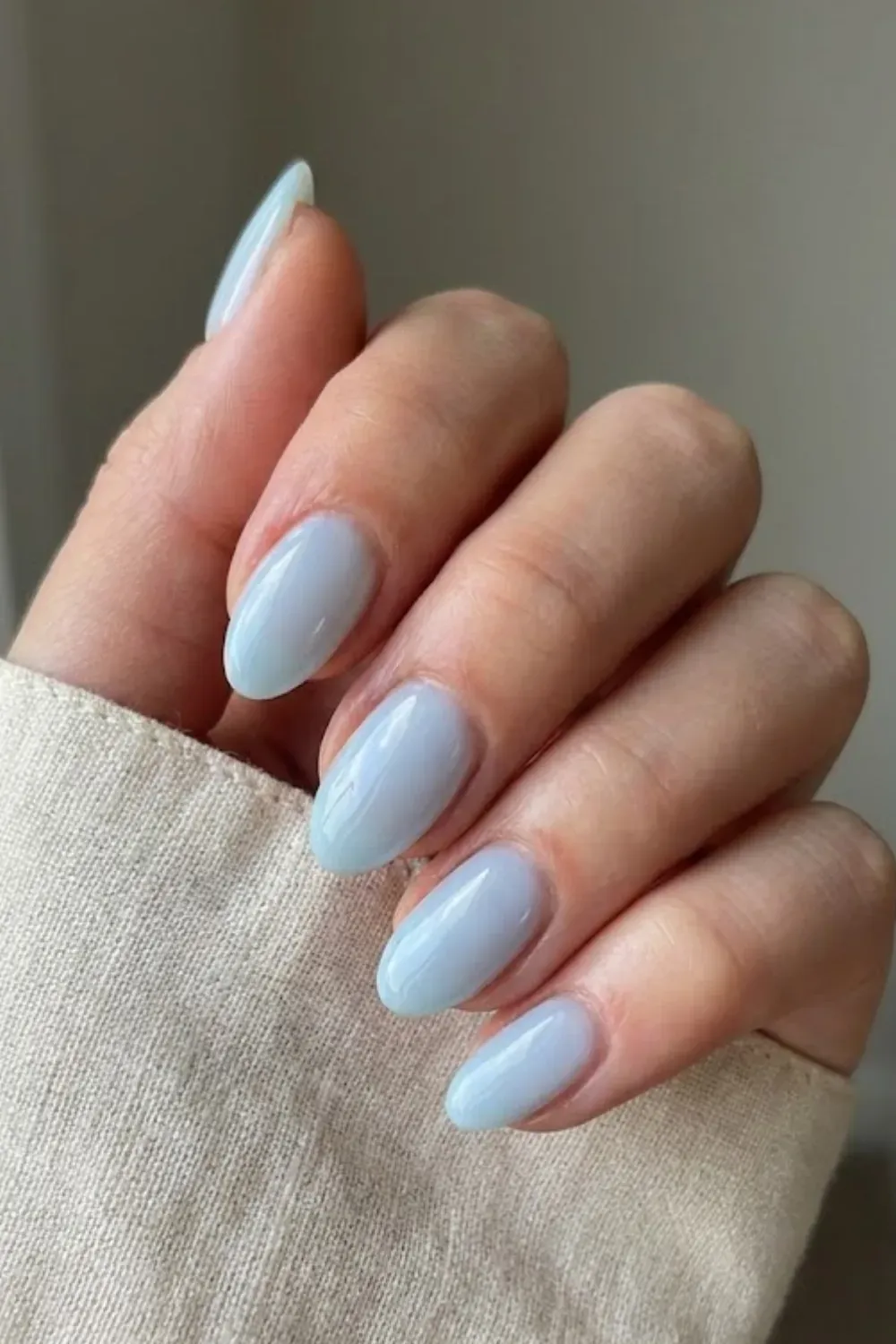 Icy Baby Blue – Pale light blue gel nails almond shape winter clean girl