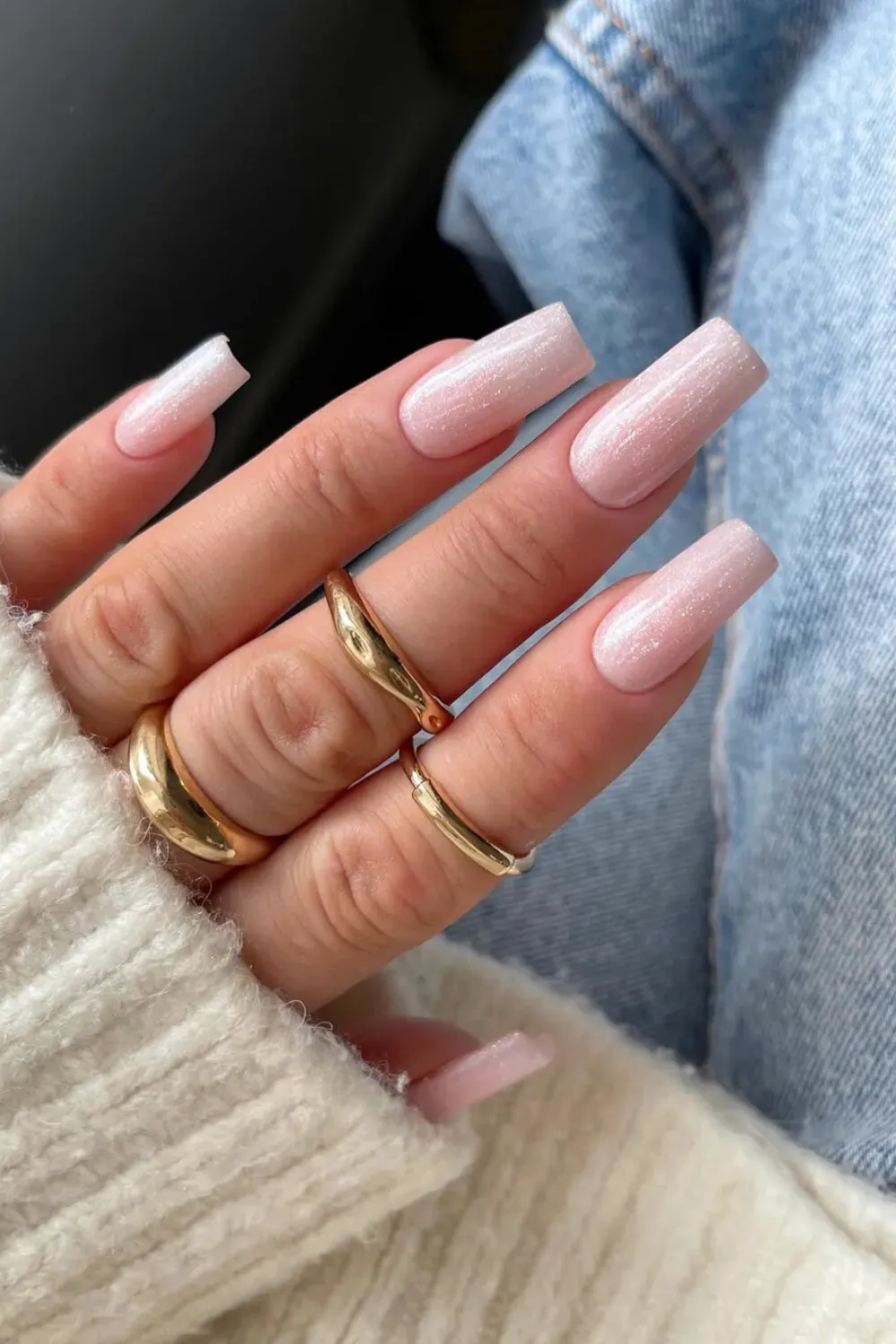 Shimmering Frosty Pink - Long square nails with a uniform shimmery pearl pink finish for winter.