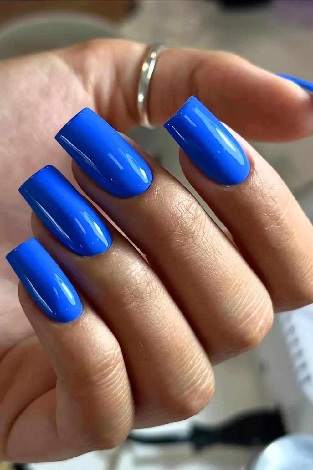 Classic Cobalt Blue Long Square Nails – Long square nails painted in a solid, high-gloss vibrant cobalt blue for a bold and clean look.