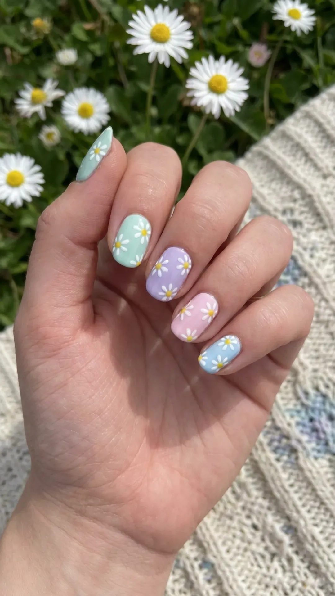 tiny daisy floral March nails on pastel base