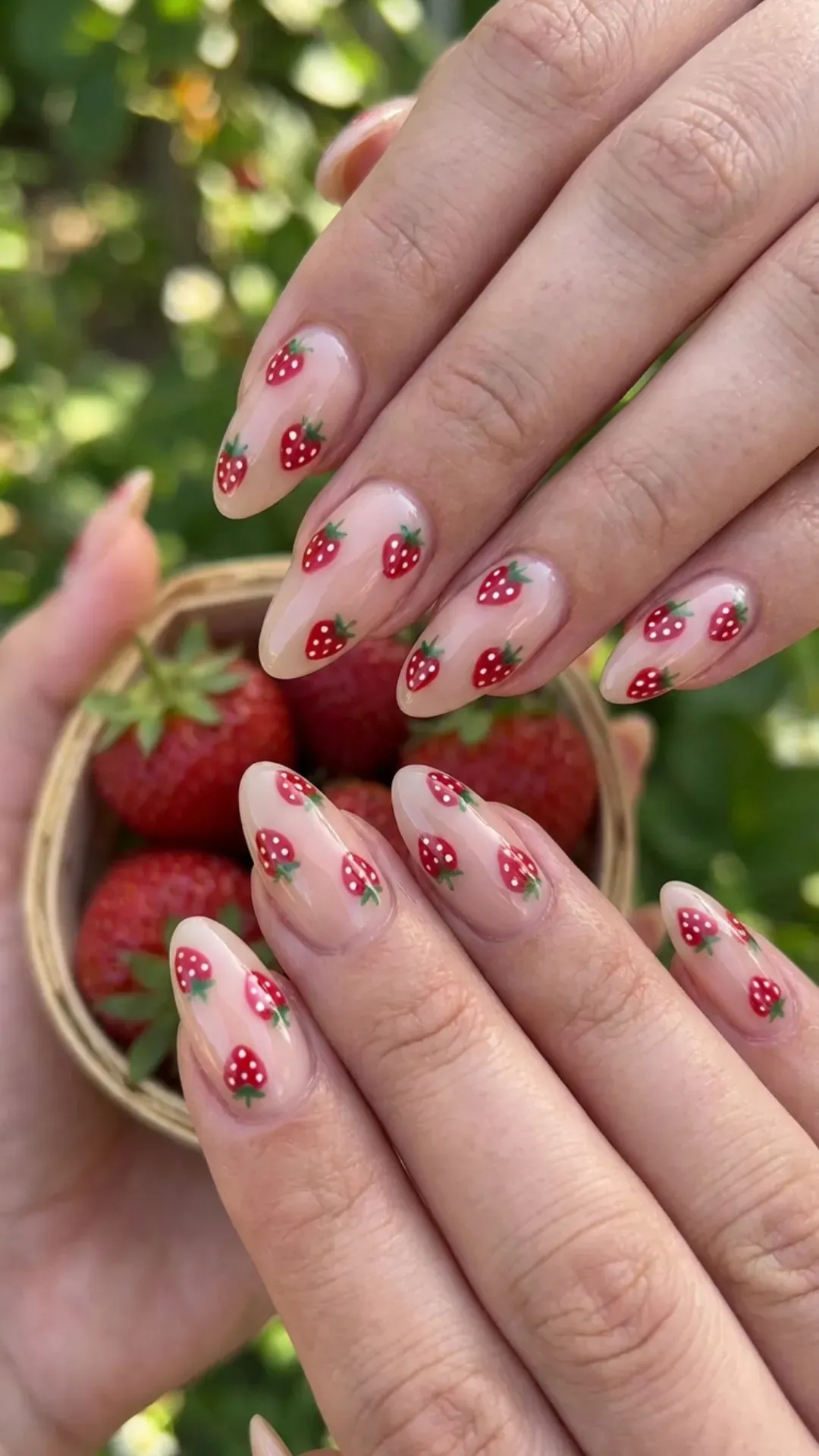 Cute strawberry gorgeous nails on nude base, glossy finish