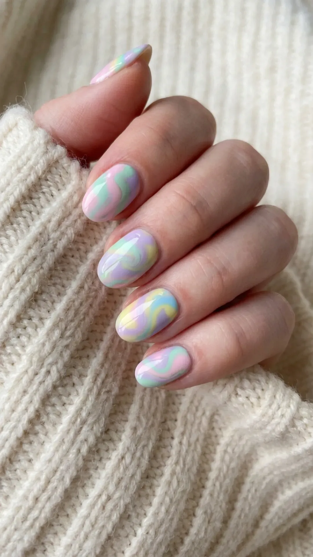 pastel rainbow swirl March nails on glossy base