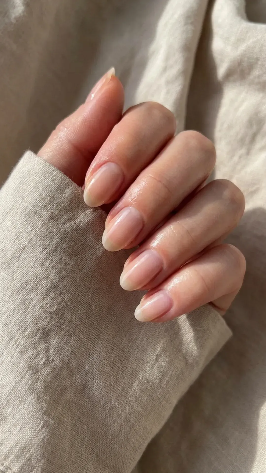 glossy natural nude March nails clean girl style