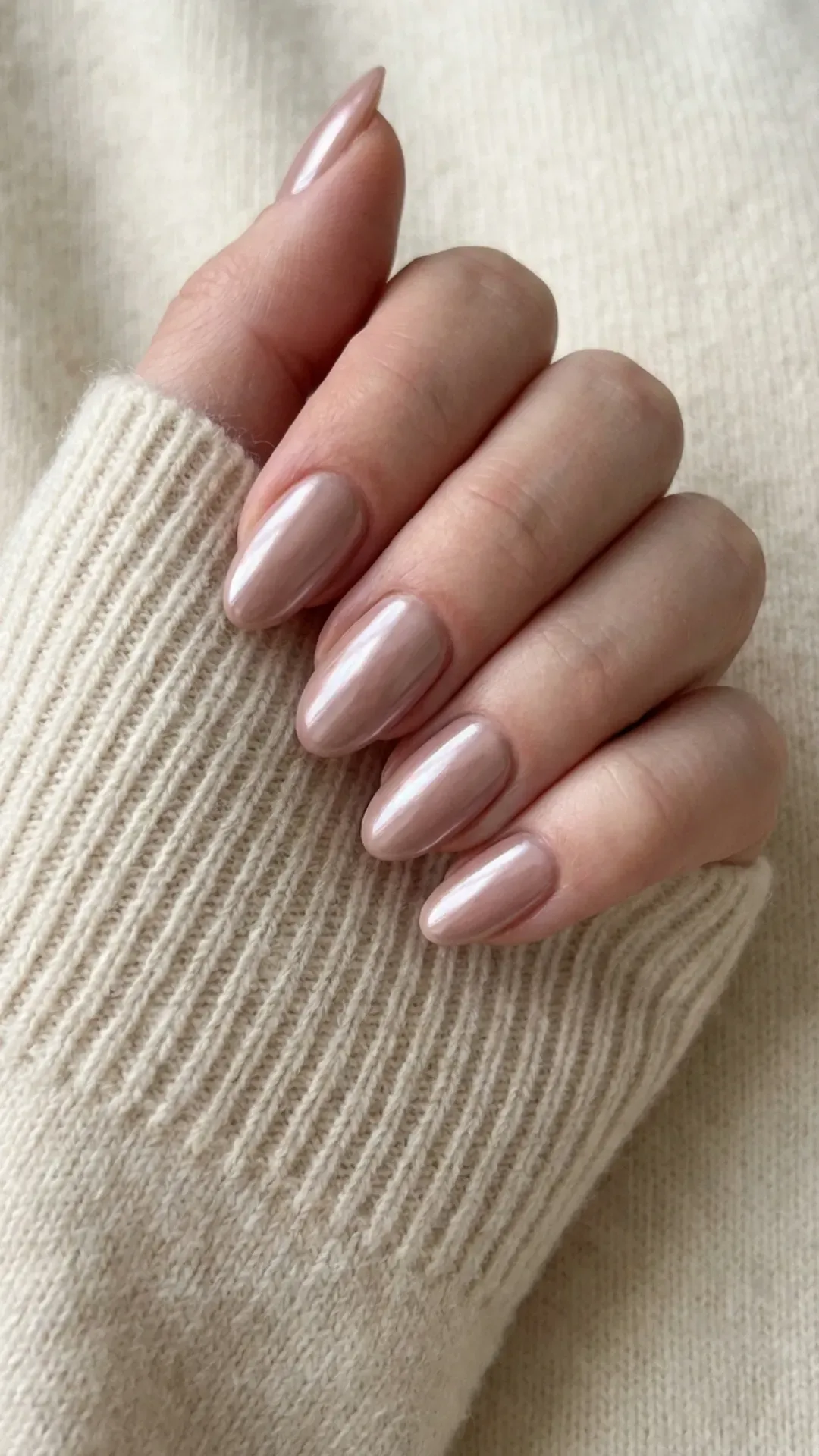 nude chrome March nails with reflective finish