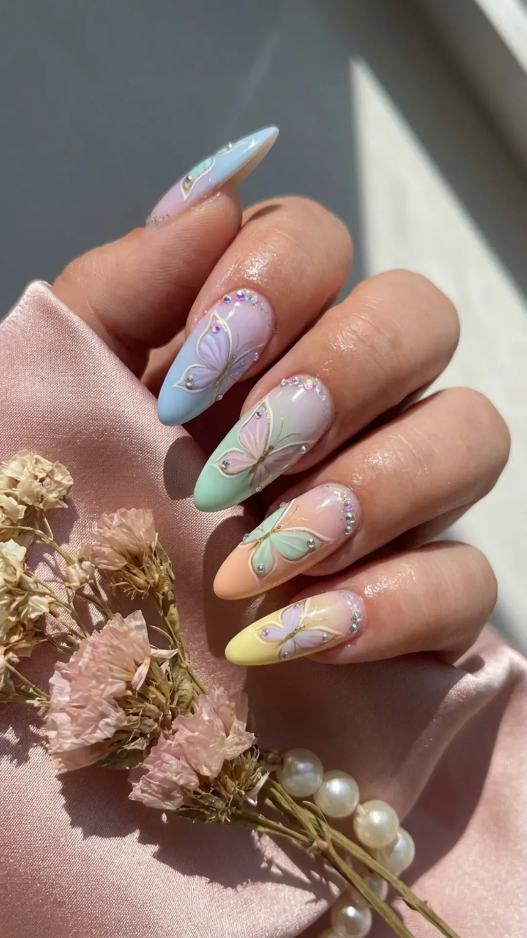 pastel butterfly March nails on glossy base