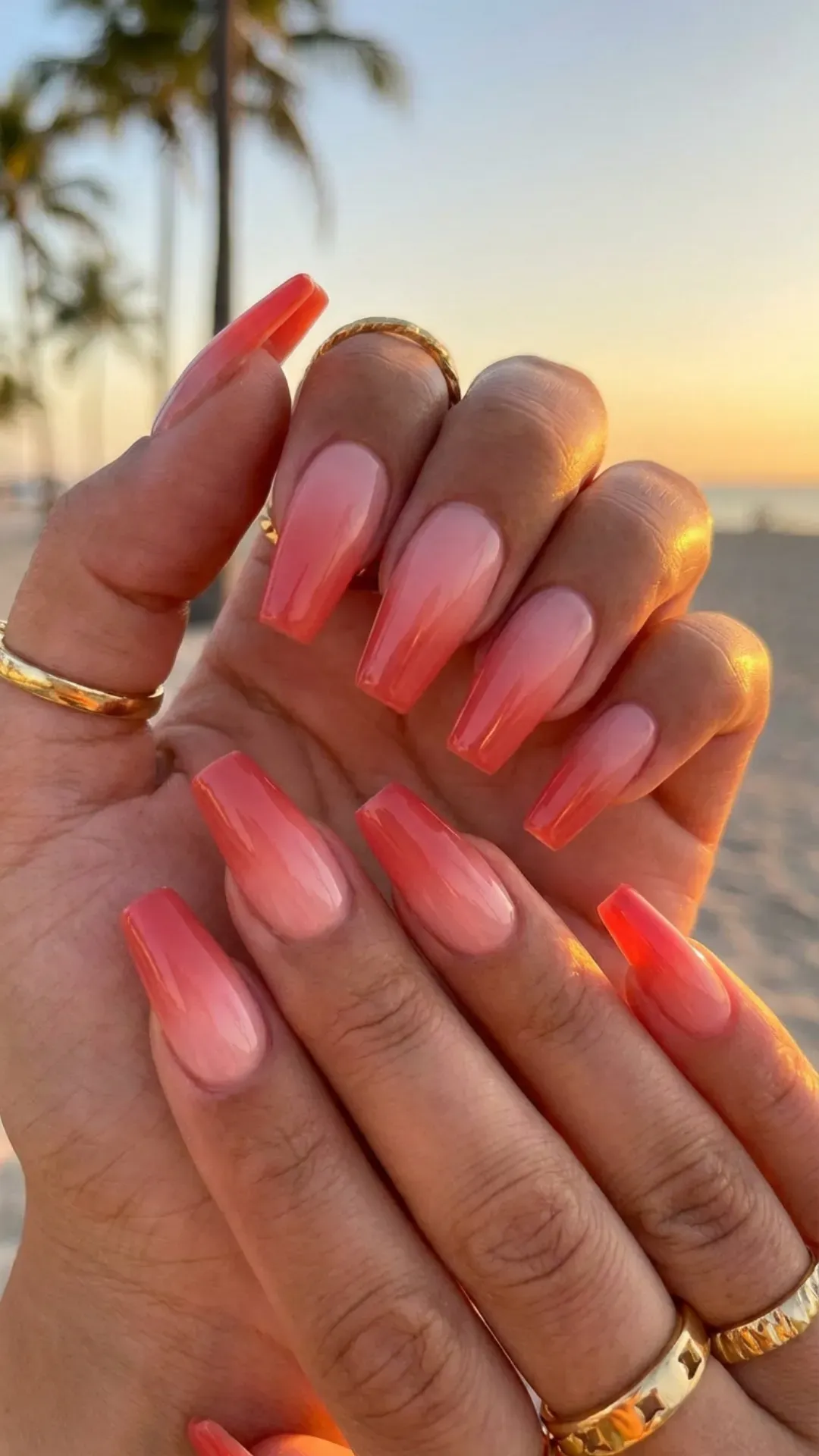Sunset coral pink ombre nails