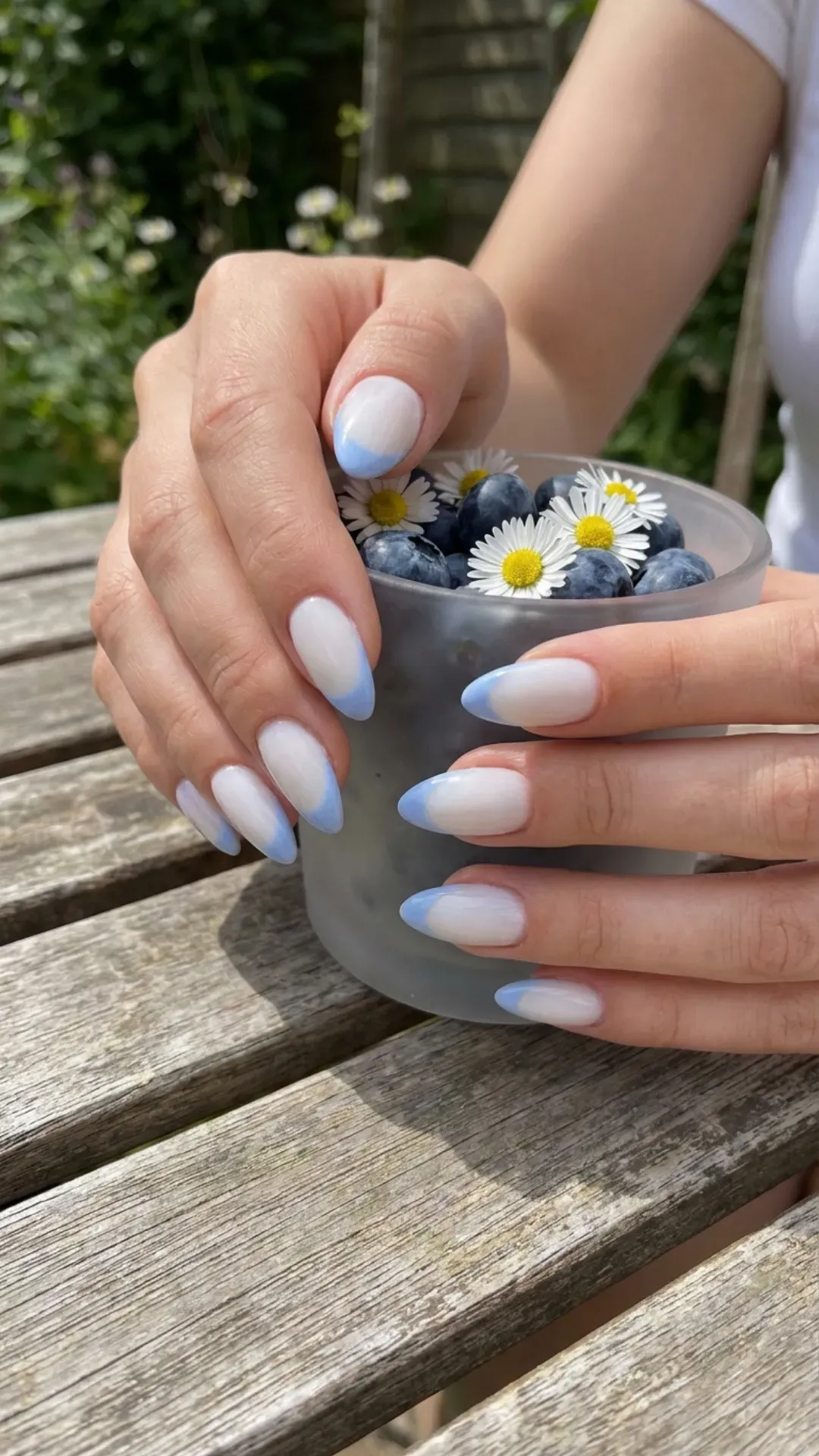Elegant blueberry milk French tip nails with a creamy pastel blue hue, ideal for a refreshing summer vibe