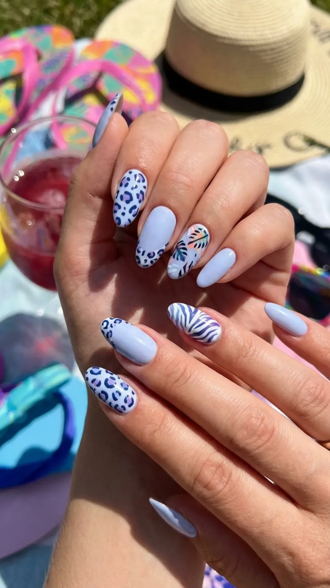 Trendy blueberry milk animal print nails with a hint of wild patterns, perfect for making a bold summer statement