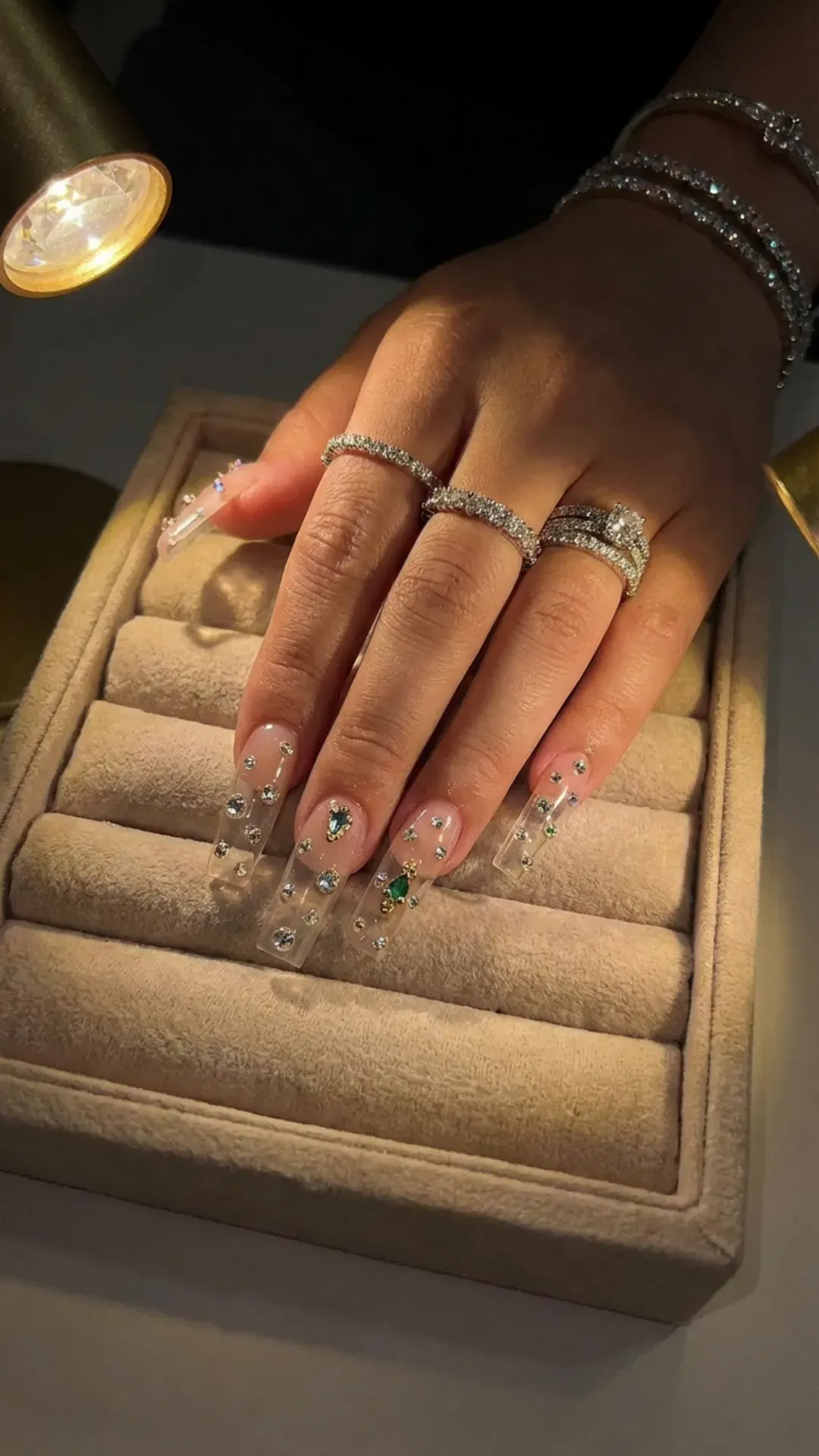 Clear acrylic prom nails with embedded crystals, ultra glam manicure