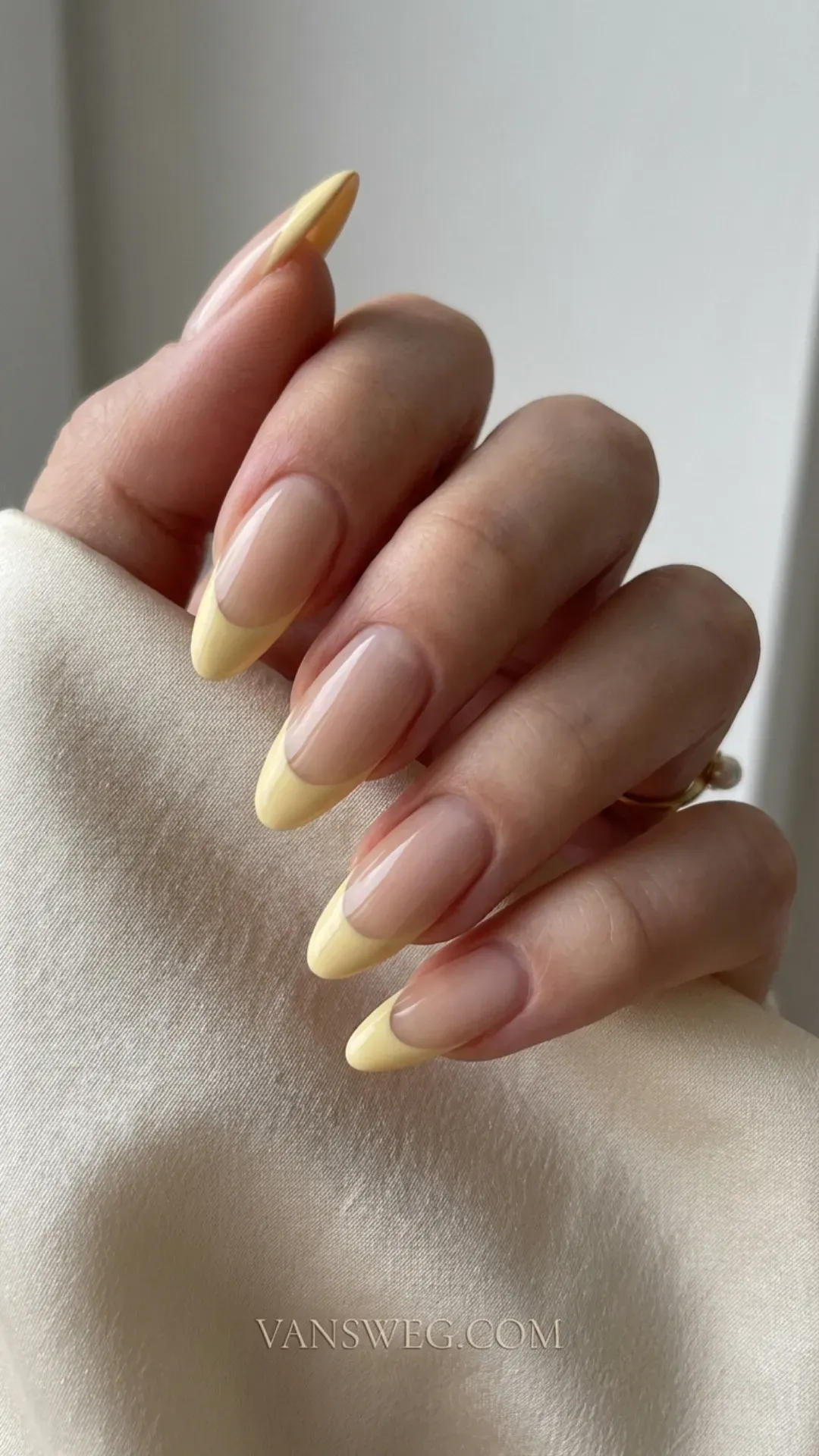 Modern butter yellow French tip nails design