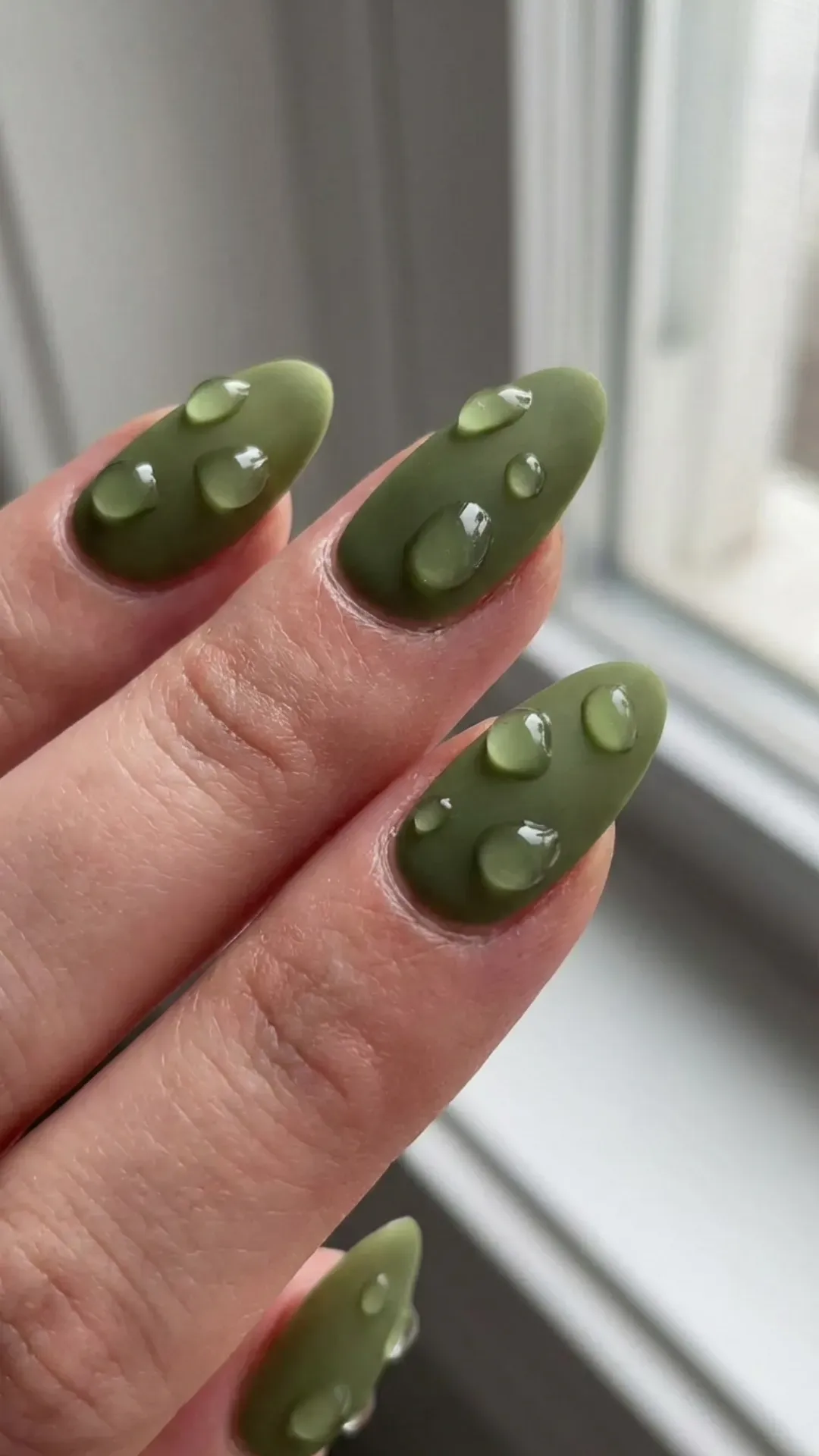  Matte olive green nails covered in clear 3D gel water droplets VANSWEG.COM