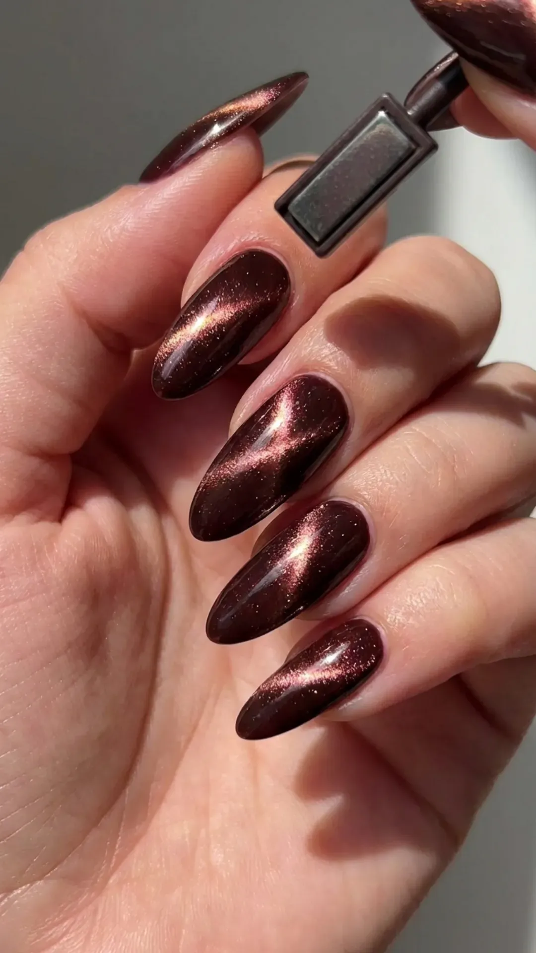 Striking diagonal cherry mocha cat eye gel nails VANSWEG.COM