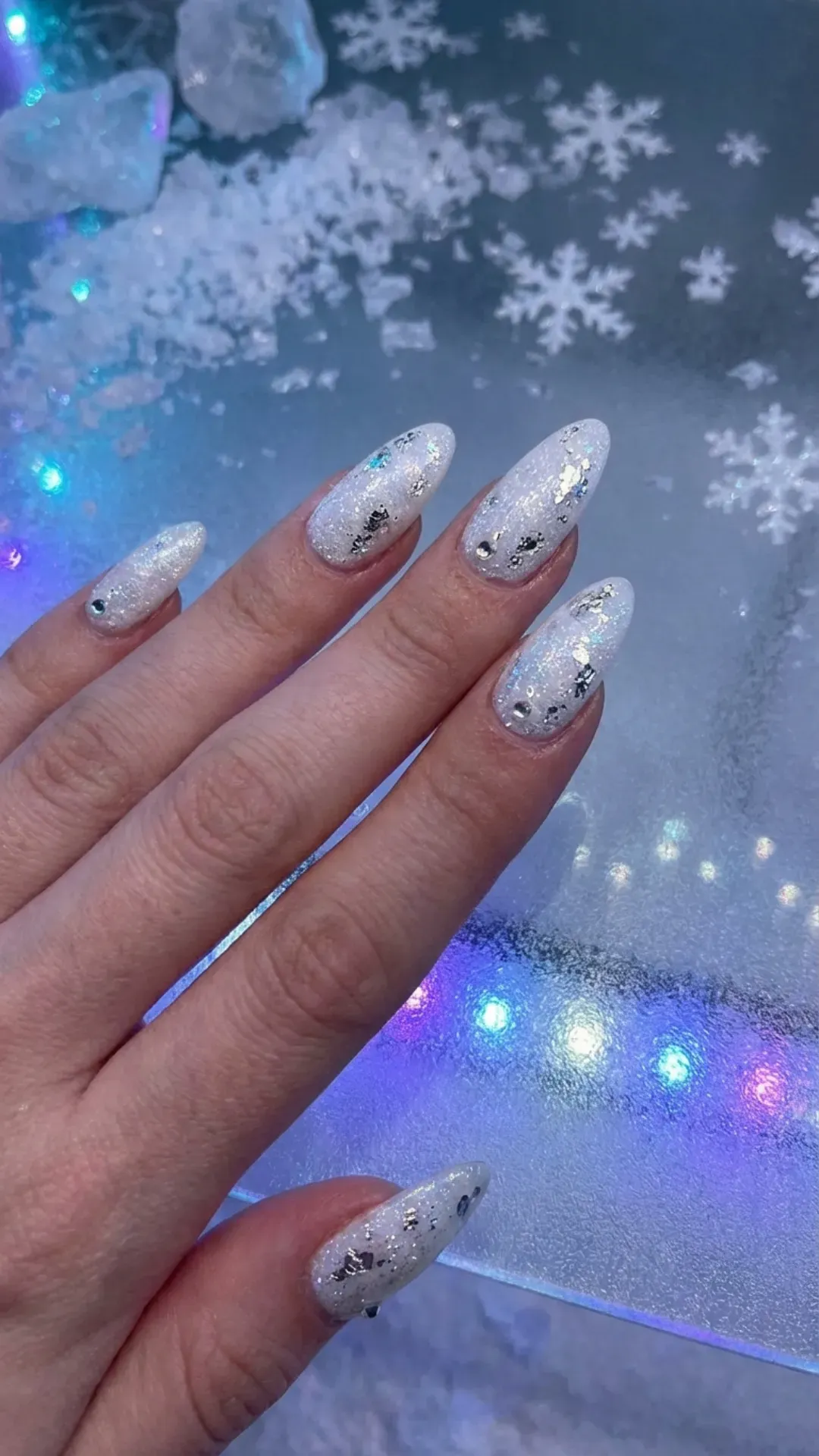 White glitter prom nails with silver accents, icy snow queen manicure